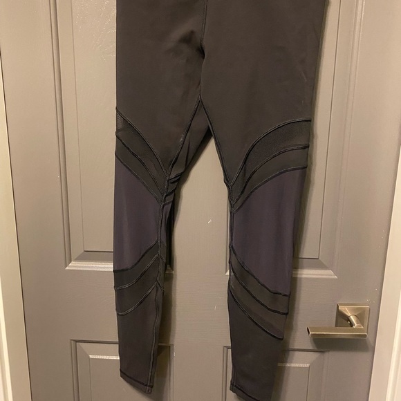 Size 10 lululemon leggings with mesh cutouts. Never worn in great condition. - Picture 1 of 1